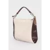 Textile and genuine leather bag