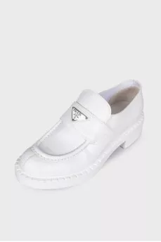 White leather loafers