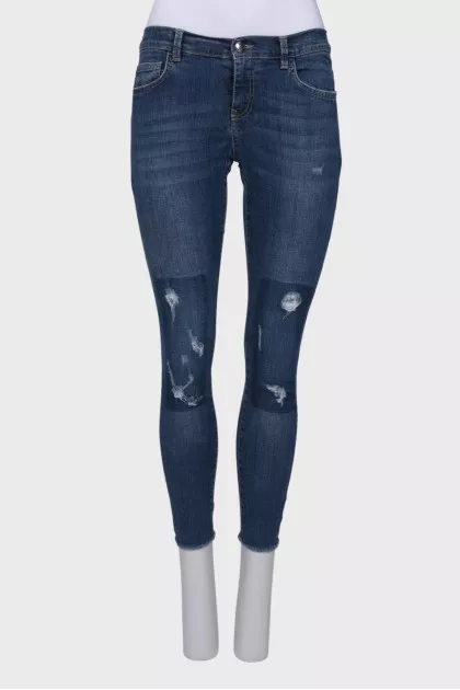 Light blue distressed jeans
