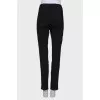 Black wool trousers with zippers