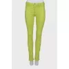Light green jeans with a tag
