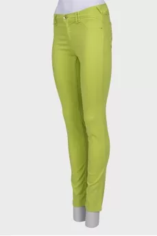 Light green jeans with a tag