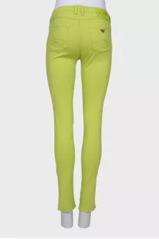 Light green jeans with a tag