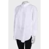 White blouse with button fastening