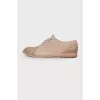 Light gray leather brogues