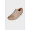 Light gray leather brogues