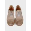 Light gray leather brogues