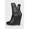 Black leather wedge boots