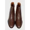 Embossed brown leather ankle boots