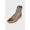 Brown leather lace-up boots