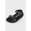 Black sandals with metal inserts