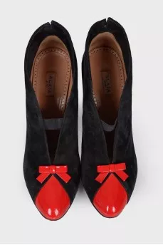 Suede shoes with red inserts