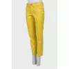 Yellow jeans with side zipper