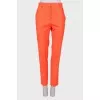 Wool orange trousers with tag