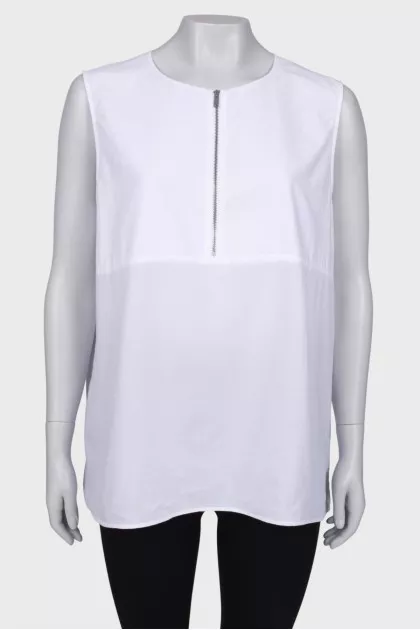White blouse with a zipper at the collar