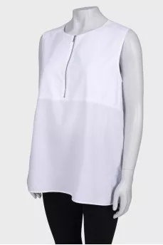 White blouse with a zipper at the collar