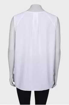 White blouse with a zipper at the collar