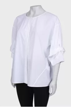 White blouse with binding on the sleeves