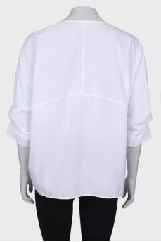 White blouse with binding on the sleeves