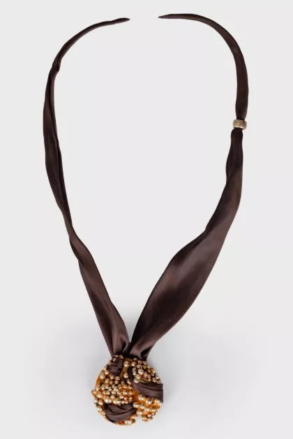 Textile and silver necklace