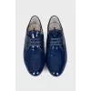Patent blue lace-up shoes