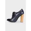 Leather shoes with wooden heels