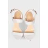 White embossed sandals