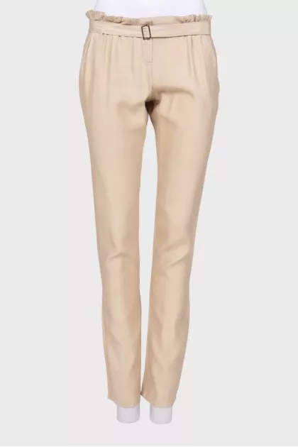 Beige trousers with belt