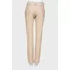 Beige trousers with belt