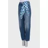 Jeans with removable silk scarf