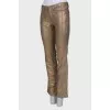 Patterned golden trousers