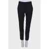 Wool trousers with a slit at the bottom