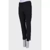 Wool trousers with a slit at the bottom