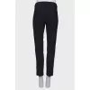 Wool trousers with a slit at the bottom