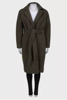 Green coat on the belt