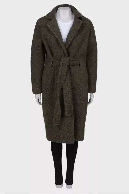 Green coat on the belt