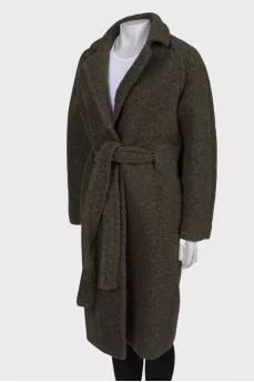 Green coat on the belt