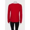 Red sweater with slits