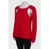 Red sweater with slits