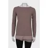 Sweater with ruffles at the hem