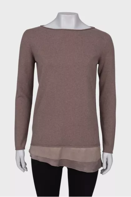 Sweater with ruffles at the hem