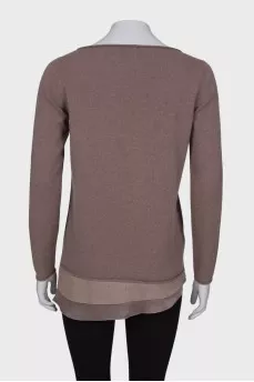 Sweater with ruffles at the hem