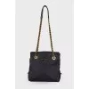 Textile bag with triangular logo