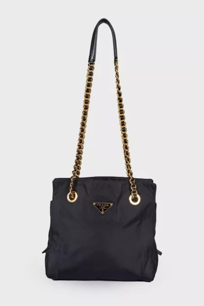 Textile bag with triangular logo