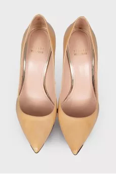 Beige leather pumps