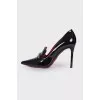 Lacquered shoes with silver hardware