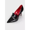Lacquered shoes with silver hardware