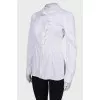 Blouse with ruffles at the collar