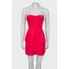 Red dress with frills, with a tag