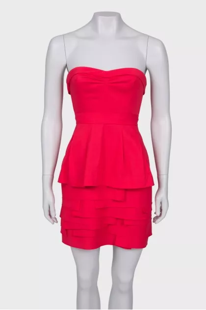 Red dress with frills, with a tag